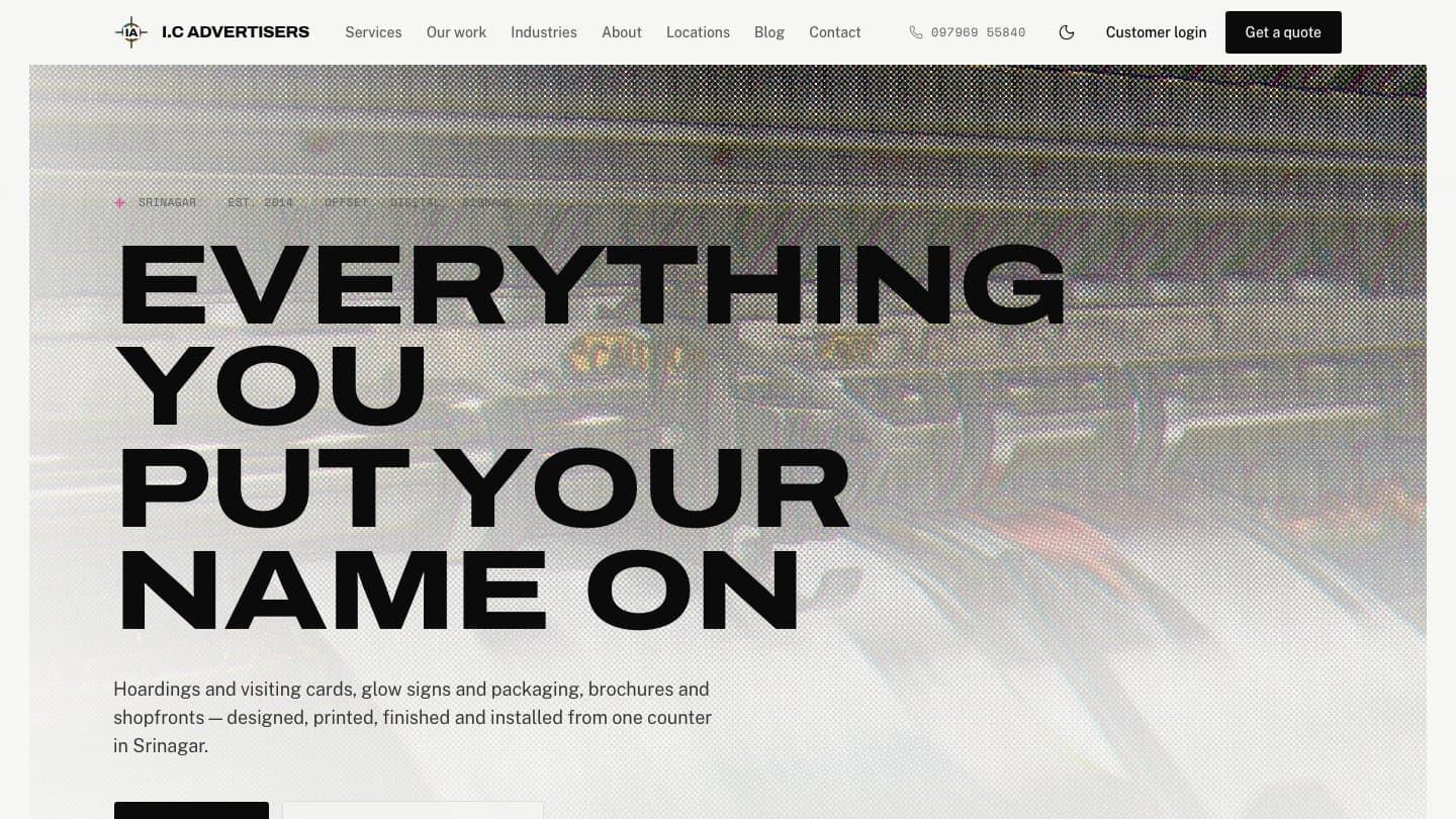 I.C Advertisers homepage in light mode, with the headline “Everything you put your name on” in heavy capitals over a halftone photo of a printing press, and Get a quote and Send artwork on WhatsApp buttons
