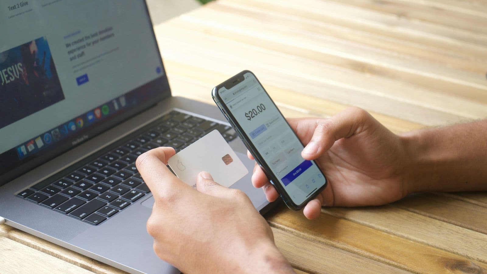 Paying from a phone with a card in hand — the two seconds of a fintech product that the user sees, and the six months of engineering they never do