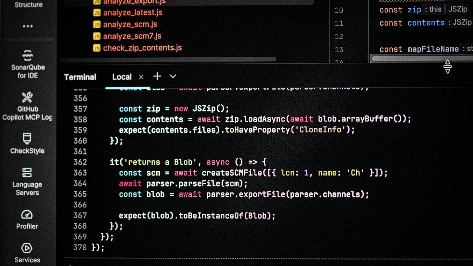 A code editor with a file tree and a terminal panel open, showing test code and command output. Small, well-described commits make a project's history easy to follow for anyone who opens it