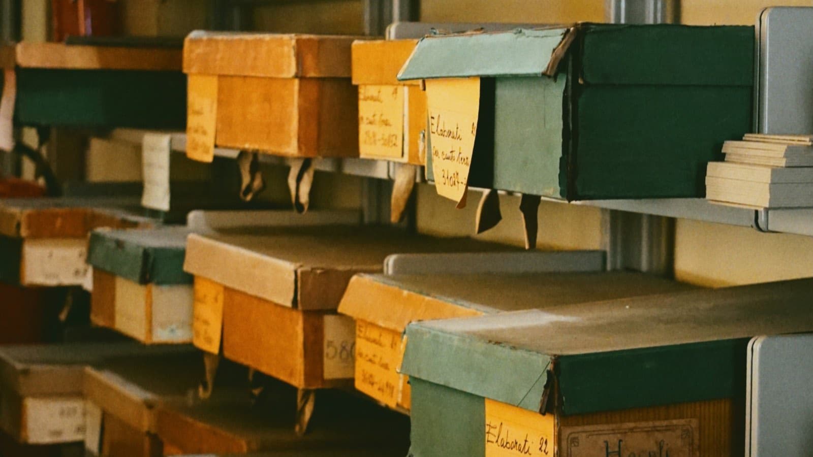 Labelled archive boxes stacked on shelves — a good project structure isn't about tidiness, it's about being able to find and delete things without fear