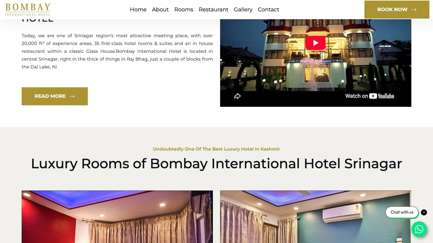 Bombay International Hotel about section with an embedded YouTube video of the hotel at night, above the “Luxury Rooms of Bombay International Hotel Srinagar” room listing